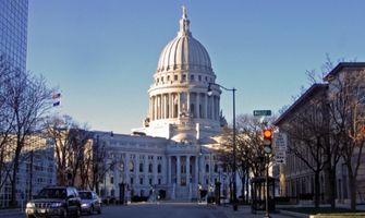 Wisconsin companies city of Madison join challenge to cut carbon emissions in half by 2030 | Wisconsin Public Radio